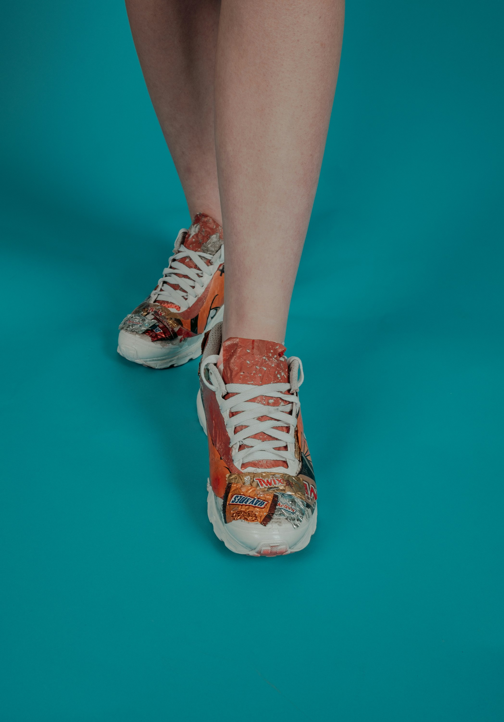 orange-and-white low-top sneakers